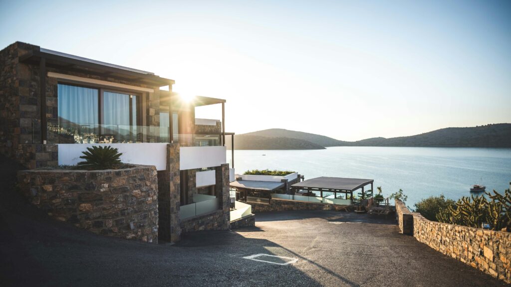 pexels-photo-1732414-1732414 Elegant modern house by the lake with stunning sunrise view. Ideal real estate.